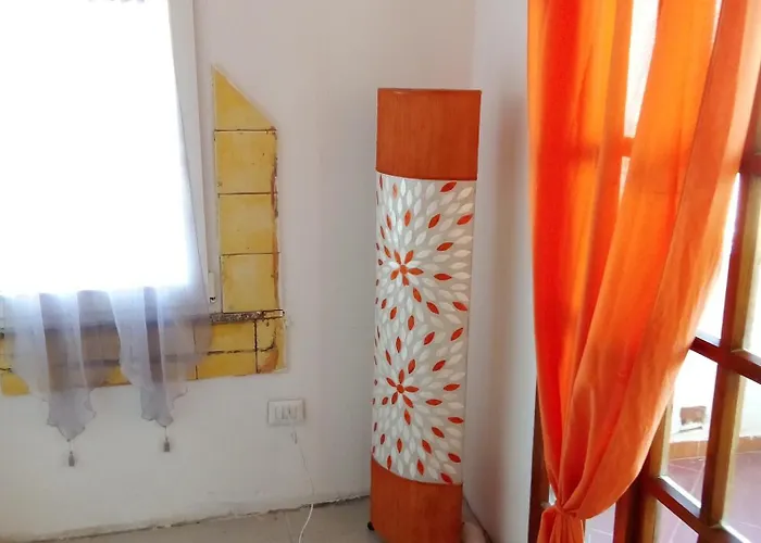 Quarto em Acomodações Particulares Room's Con Bagno Privato Olbia